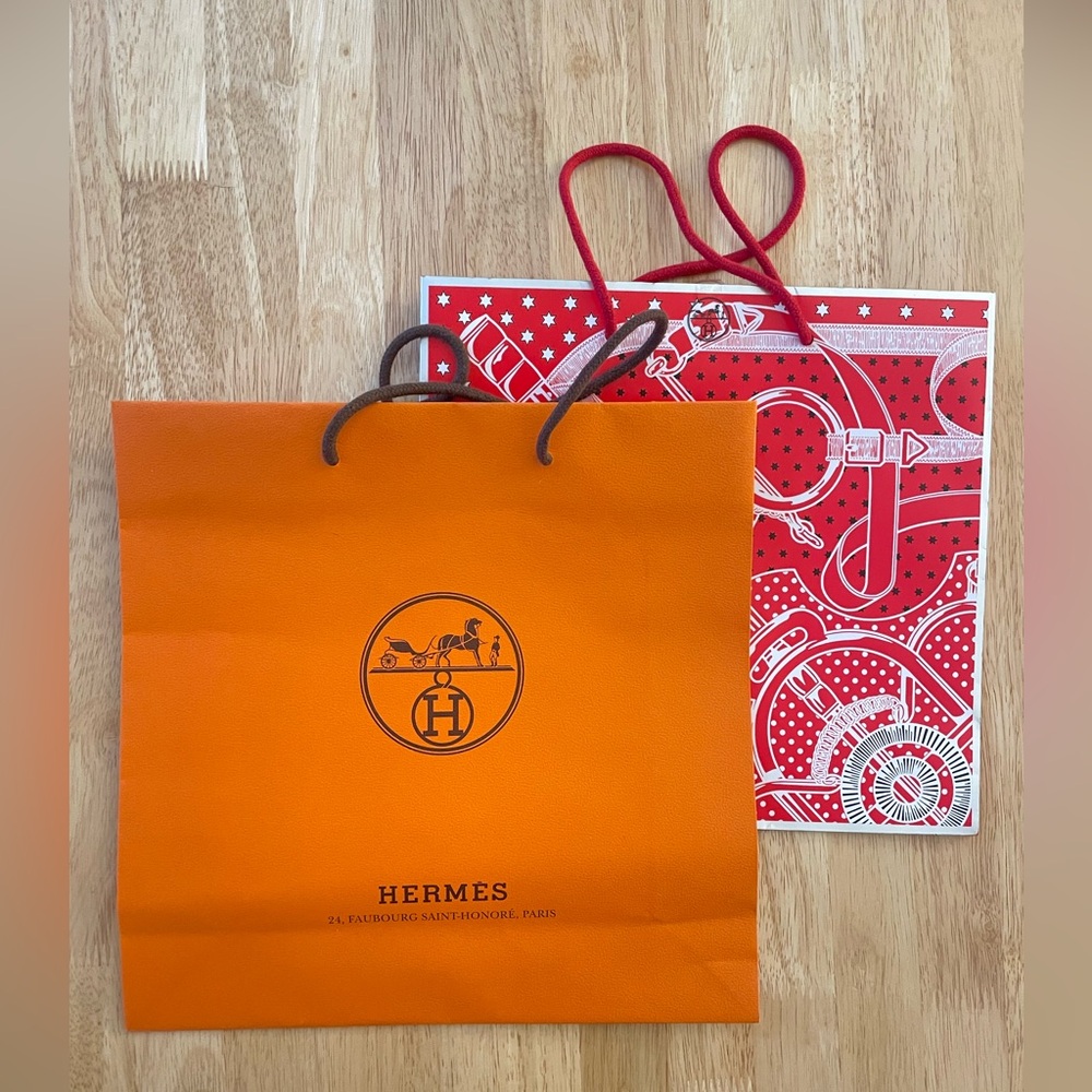 Hermes shopping bags - one regular, one holiday limited edition.